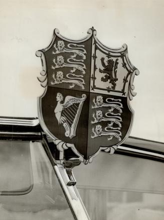 Crest of king George, Mounted above the windshield of the royal car in which rides the King will always be the King's crest, with the royal standard flying from a short staff above