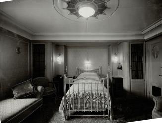 Ease for the king during a delayed crossing was provided by the roomier comfort of his bedroom suite, shown here, and other apartments aboard the Empress