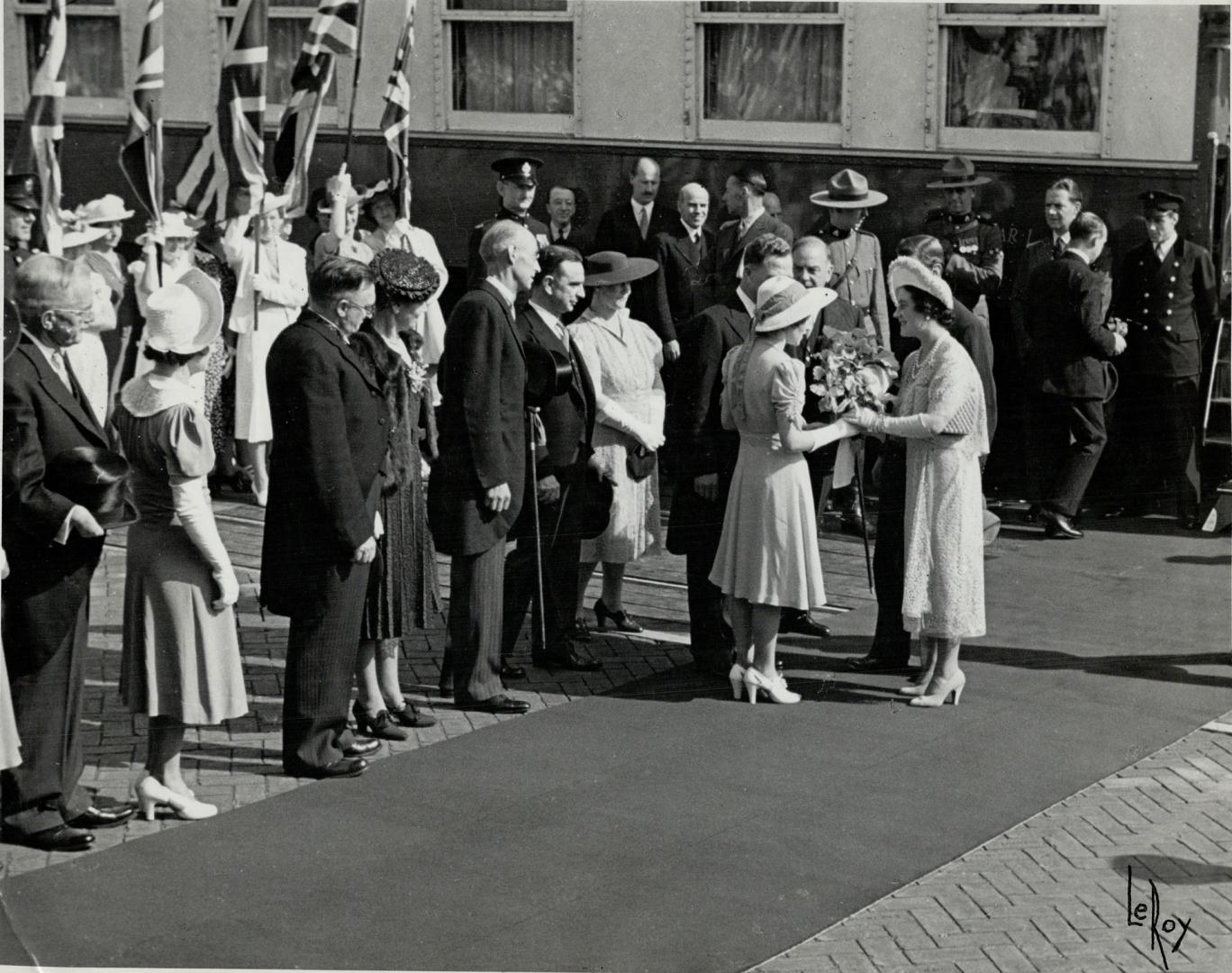 Presentation of Bouquet, L. to R. Alderman Garland - Miss Grant Ald Peter Grant, Mrs. of H. Wilson - Ald Wilson - City H.H. Smith Mrs Daly - Mayor Daley - Miss Daley making presentation. [Incomplete]