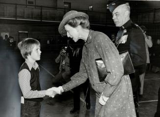 In awe: Bobby Hayden, 10, of Agincourt got to shake hands with Princess Alexandra yesterday at a reception on Moss Park Armory's drill floor for junior ranks