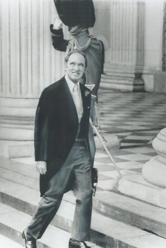 Representing Canada at the Jubilee service, Prime Minister Pierre Trudeau climbs the steps of St