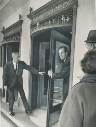 Prince Philip Caught in Revolving Door At Royal York Hotel, Philip seemed dazed, and steadied himself by gripping the door