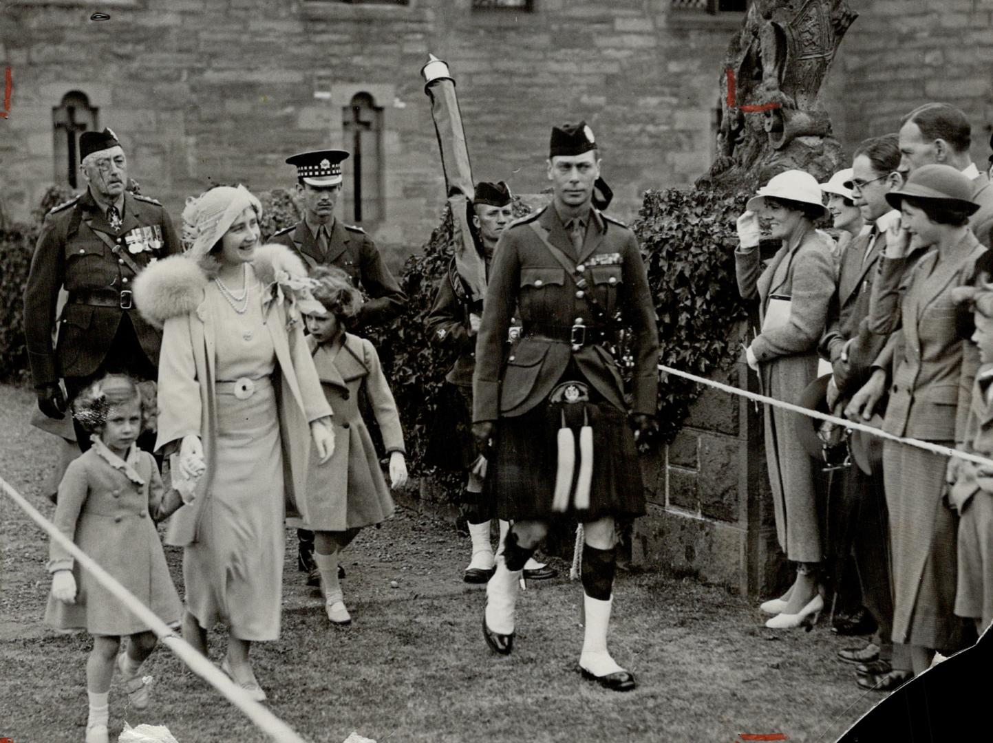 The Duke and Duchess of York, with their children, attending the ceremony at Glamis Castle when the 45th Black Watch received new colors replacing those lost in a fire at Dundee last year