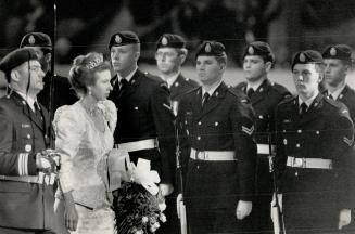 Royal Attention: Princess Anne Inspects a guard of honor at the Royal Agricultural Winter Fair in a visit in 1988