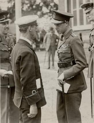 Primoe of wales at Bisley, The prince of Wales chatting to dunner Robertson who was on the renown with the Prince