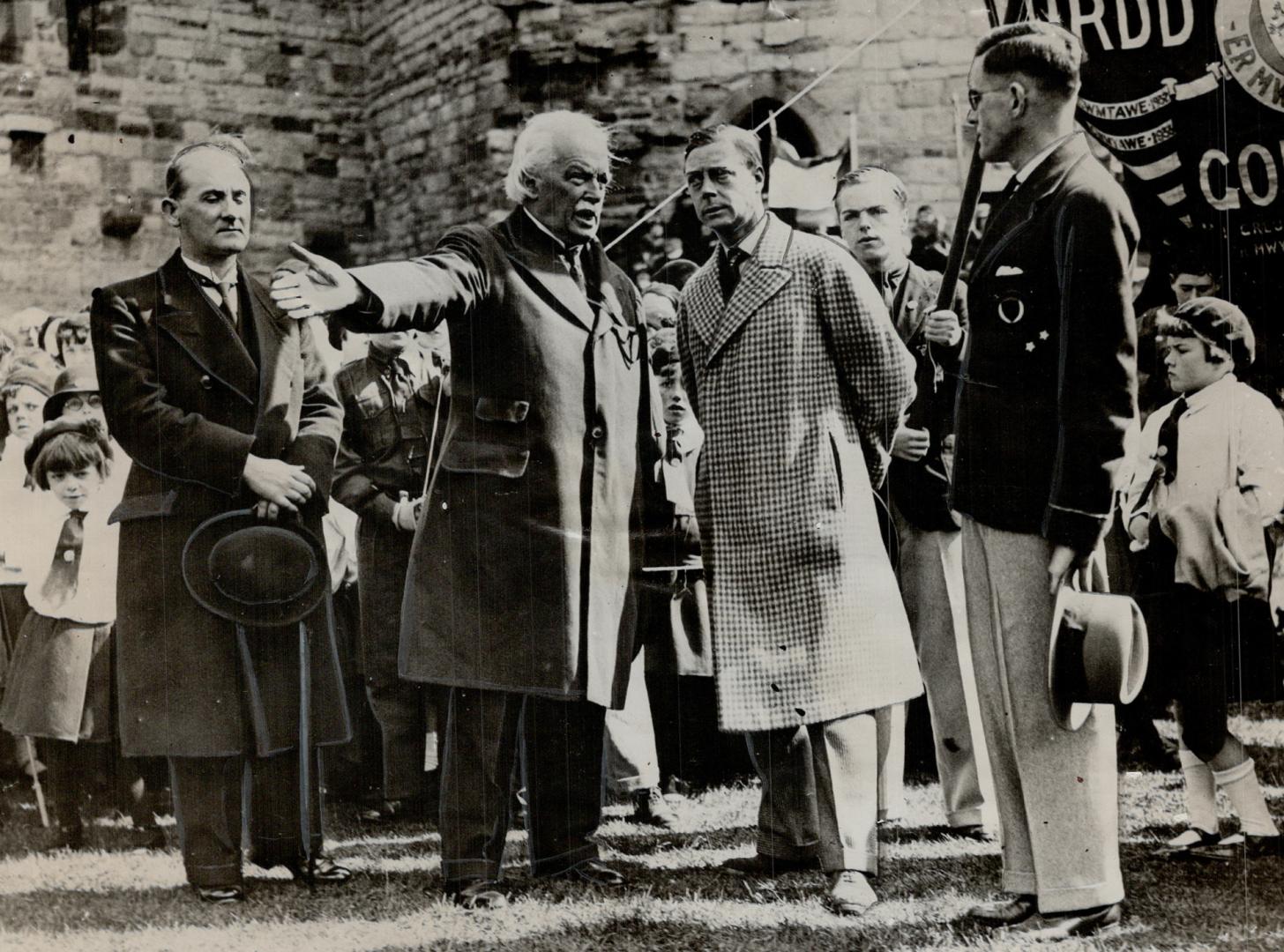 Prince Of Wales Listens And Then Inspects, His royal highness lends both ears wen Lloyd George, British Liberal leader, starts in to tell him all abou(...)
