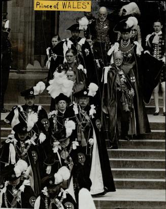 King George, Queen Mary Duke of Connaugh, etc after ceremony of investing prince of wales with insignia as Knighn of the starter at St. George's Chanel, windsor. [Incomplete]