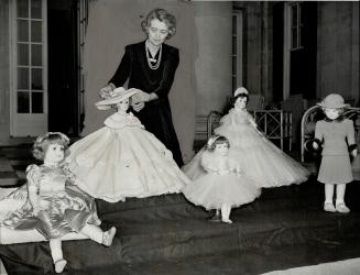 Princess Elizabeth and Princess Margaret Rose, daughters of the King and Queen, have presented their dolls to the British war relief in the U.S. [Incomplete]