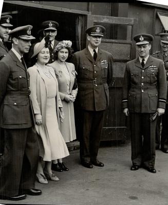 The King and Queen and Princess Elizabeth are shown at a Canadian bomber station in England