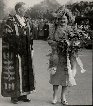Queen Elizabeth has a liking for ostrich plumes and pearls