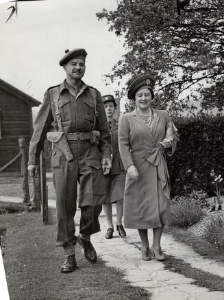 Commanding officer of Black Watch regiment conducts Queen Elizabeth on recent inspection of Canadians units