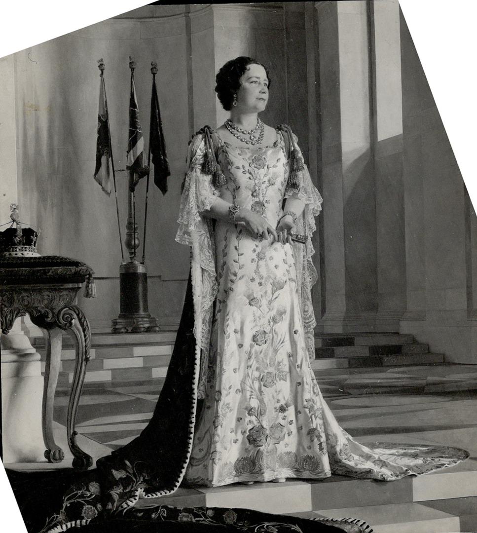 Queen's attire in which silk and ermine, velvet, lace and flowered damask combine with a long trailing train in gorgeous effect