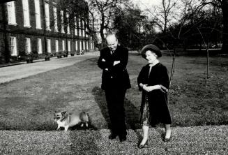 Toronto Star reporter Val Sears walks through the grounds of Clarence House with the Queen Mother
