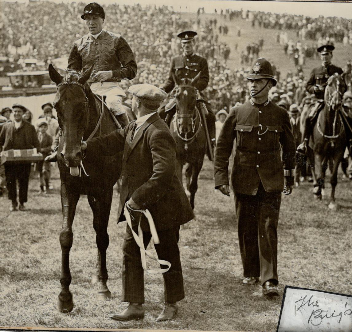 The King's horse, London Cry, being led in after winning the Goodwood stakes