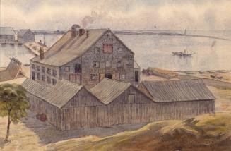 Image shows a few waterfront buildings with a sign "Soap & Candle Factory".