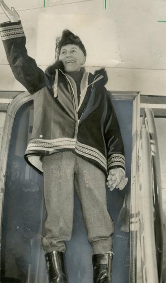 Governor-General Vincent Massey waves as he leaves on 10,000 mile, 17-day inspection to Canadian Arctic