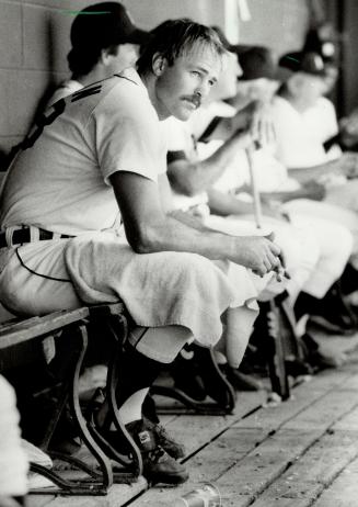 Don't bug him: You would never consider Detroit's Kirk Gibson as easygoing, and the sign at right, hanging over his locker warns unwary passersby