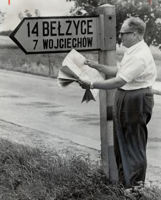Belzyce wasn't on his map Givens checks signpost
