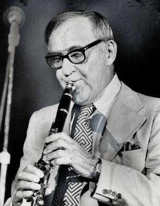 Benny Goodman played to thousands of people last night who jammed the lawns of the CNE bandshell to hear the 64-year-old musician. Second concert is tonight