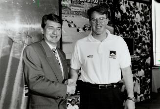 Canda's 1-2 Indy Punch: Scott Goodyear, left, and Paul Tracy wish each other well in Toronto yesterday as they prepare for the start of the 1993 IndyCar season