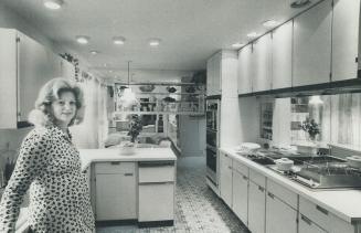Kitchen efficiency is improved by a triangular layout of the stove, sink and refrigerator, says Eva Gordon, noted Toronto architect, shown here in her(...)