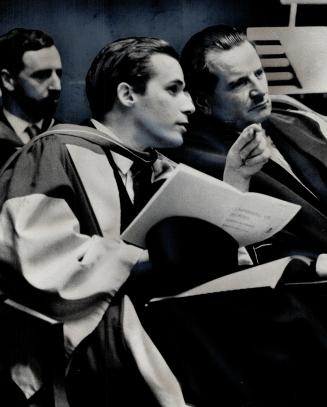 Glenn Gould chats with University of Toronto President Claude Bissell at yesterday's convocation in which the pianist received an honorary Doctor of L(...)