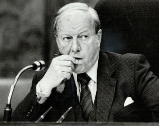 Head probe: Mr. Justice Samuel Grange listens yesterday as Sick Children's probe begins