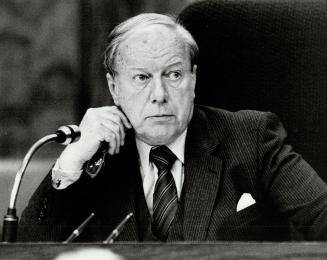 Central figures: Mr. Justice Samuel Grange, left, led royal commission inquiry into mysterious baby deaths at the Hospital for Sick Children. Central (...)