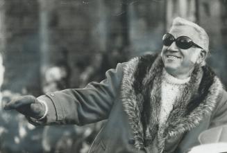 Ready for all weather, television's Lorne Greene wore fur-trimmed coat and sunglasses