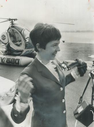 Swooping down triumphantly on Toronto for noon parade through blizzard of ticker tape and a civic reception at City Hall, Canada's Olympic skiing swee(...)