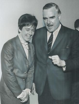 At buffet dinner tendered for her by Premier John Robarts, in the new Toronto-Dominion Centre, ski champion Nancy Greene talked and joked with her hos(...)
