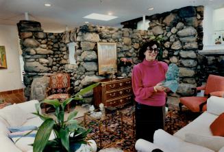 Above left, Suzy Greenspan, wife of criminal lawyer Eddie Greenspan, shows off a terra cotta bust that once crowned a German ceramic stove. The stone (...)