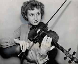 Fiddle and Lessons sold to her mother for $5 started Donna Grescoe, 21 today, on road to fame