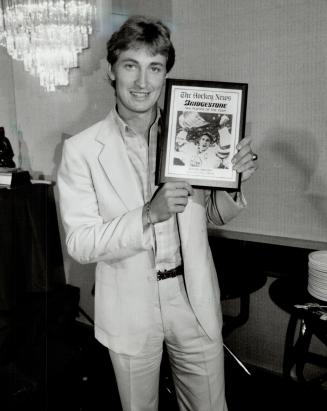Wayne Gretzky: No. 99 displays the plaque he won yesterday in recognition from The Hockey News