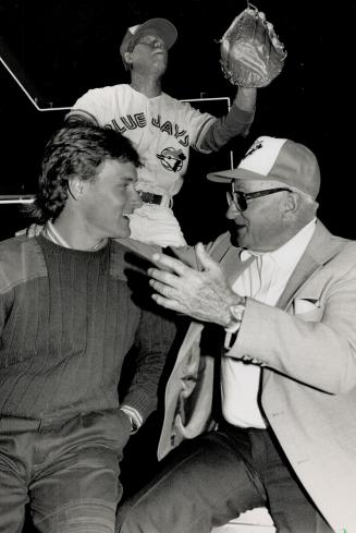 Story time: Kelly Gruber takes a break to chat with roving instructor Ellis Clary during Toronto stop of the Blue Jays caravan which heads for Buffalo today