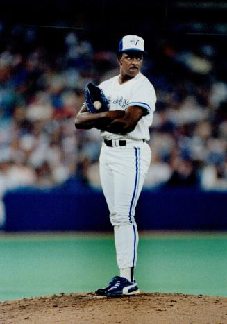 Out of the ordinary: Blue Jay all-star Juan Guzman finds himself in an odd situationéon the losing end of a 3-1 score