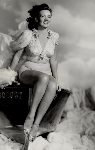 No boat ever had a handsomer figurehead than this one with MGM's Aileen Haley sitting on the bow