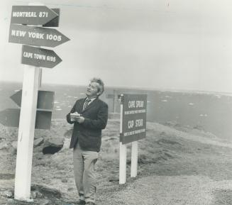 The Star's Gerry Hall checks his bearings at Canada's easternmost point, Cape Spear, Newfoundland