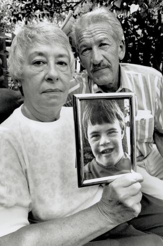 Grieving parents: Barbara and Ron Hall want to know why son Ronnie, in photo, died after visit to dentist