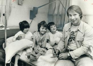Almost worth a broken leg...as youngsters in the children's wards at Queensway General hospital yesterday discussed the latest news in the hectic Stan(...)