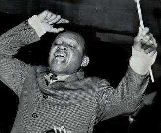 Lionel Hampton?''I play foot-padding jazz''?produces one of his wild numbers as he opened a two-week stand last night at the Friar's tavern. Hampton, (...)