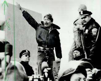 Neo-Nazi leader Karl Hand gives Fascist salute
