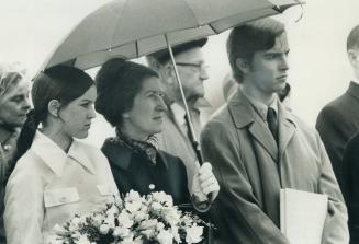 Among the mourners who braved chill wind and drizzle for Group of Seven painter Lawren Harris' rites yesterday at Kleinburg were, from left, grand-dau(...)