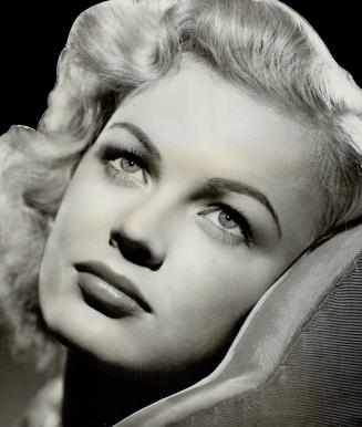 First wed in Las Vegas, Nev., March 9: Actress June Haver and Trumpeter Jimmy Zito lived apart until married in St. Timothy's Roman Catholic church, Hollywood, Wednesday