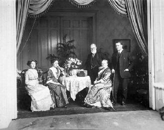 Gibson family, Sir John Morison Gibson and family in Government House, showing l