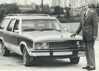Mercury Zephyr Station Wagon is new Ford of Canada entry in the mid-size range, here being shown by company vice-president Bill Hawkins. The new Mercu(...)