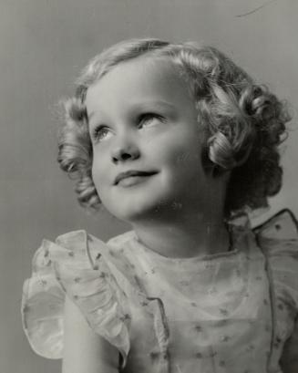 Another baby beauty contest winner is golden-haired Eva Marlene Heddle, the little Caledonia, Ont