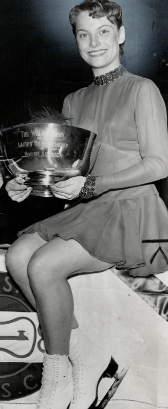 Carol Heiss, 17, romped to the ladies' singles title, placing first in every event in both the compulsory and free skating events of the contest