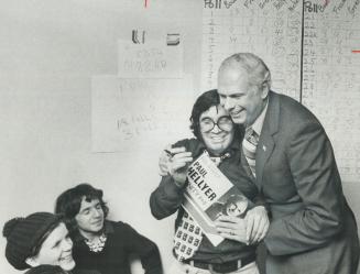 Elected as a conservative in Trinity, the riding he won for the Liberals in 1968, Paul Hellyer jubilantly hugs campaign worker Tony Gisonni. Hellyer q(...)