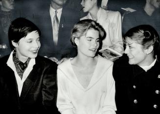 Left to right, Isabella Rossellini, Mariel Hemingway and Susan Sarandon compare notes form the front lines at Perry Ellis' show